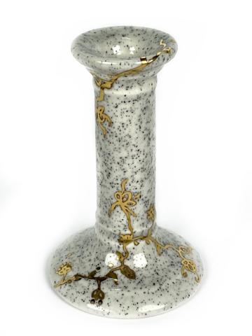 Kandelaar zwart wit gespikkeld met gouden bloemen